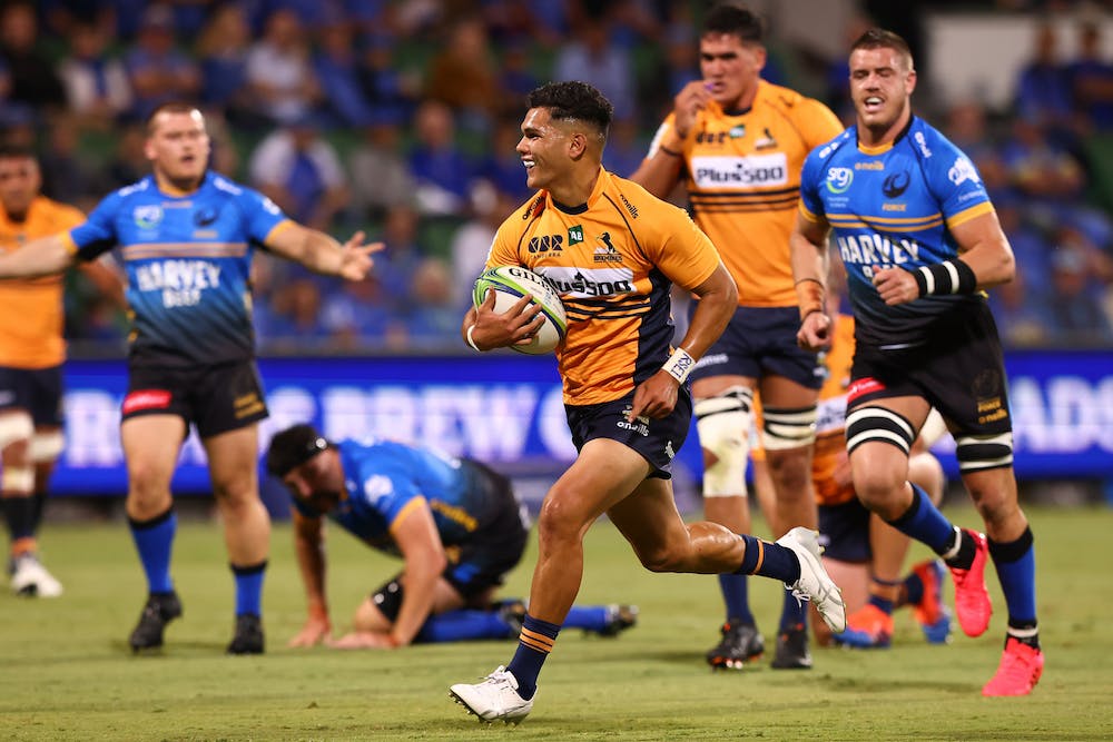 Noah Lolesio on his way to scoring the first try of the match. Photo: Getty Images